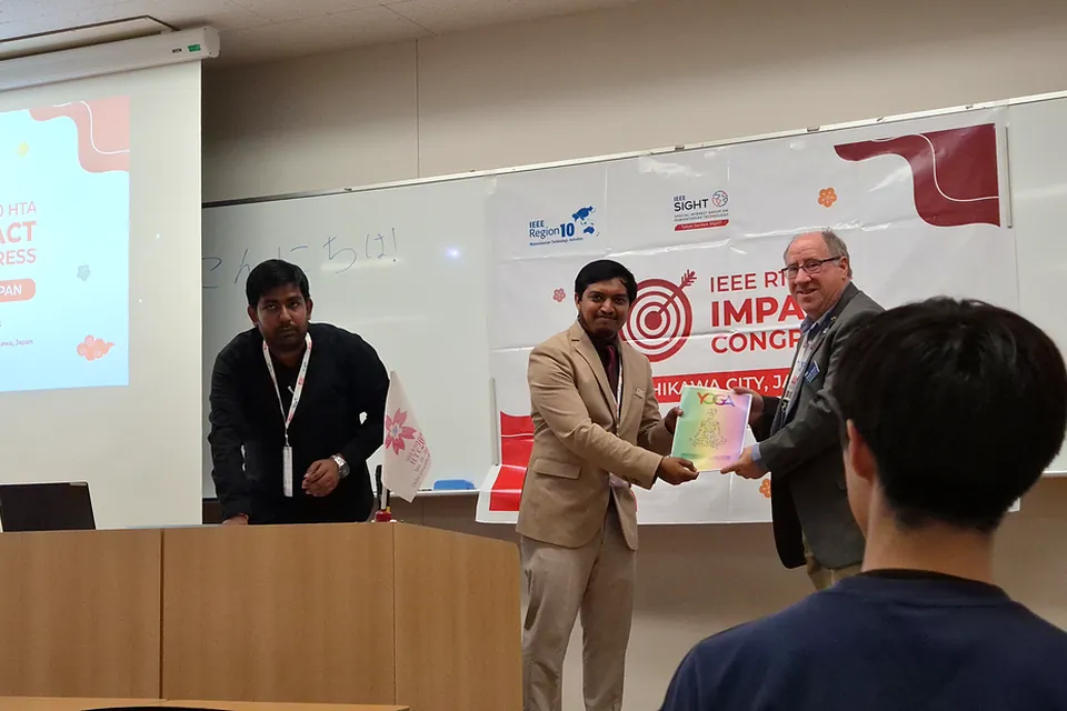 Nitin Mane recognised on stage at the IEEE R10 HTA Impact Congress, Ichikawa, Japan